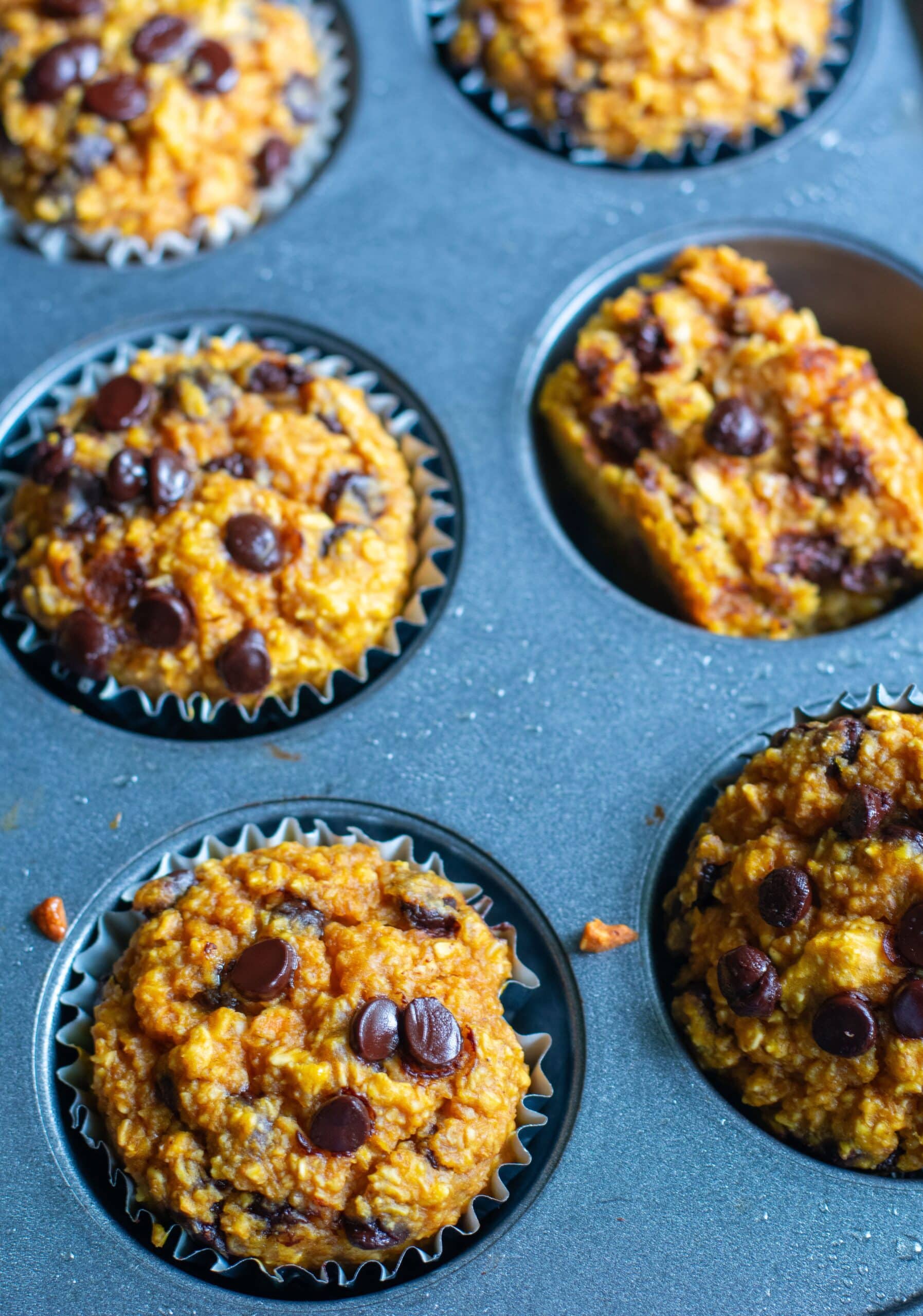 Pumpkin Muffins with Oats on a muffin baking tin