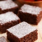 High-Fiber Black Bean Brownies squares with powdered sugar on top