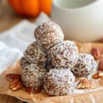 A pile of Pecan Pie Energy Balls on a brown paper