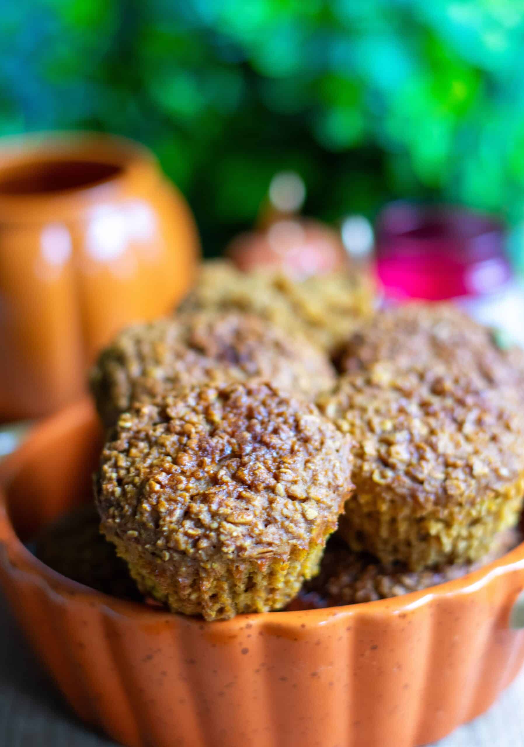 Healthy Pumpkin Protein Muffins in an orange bowl